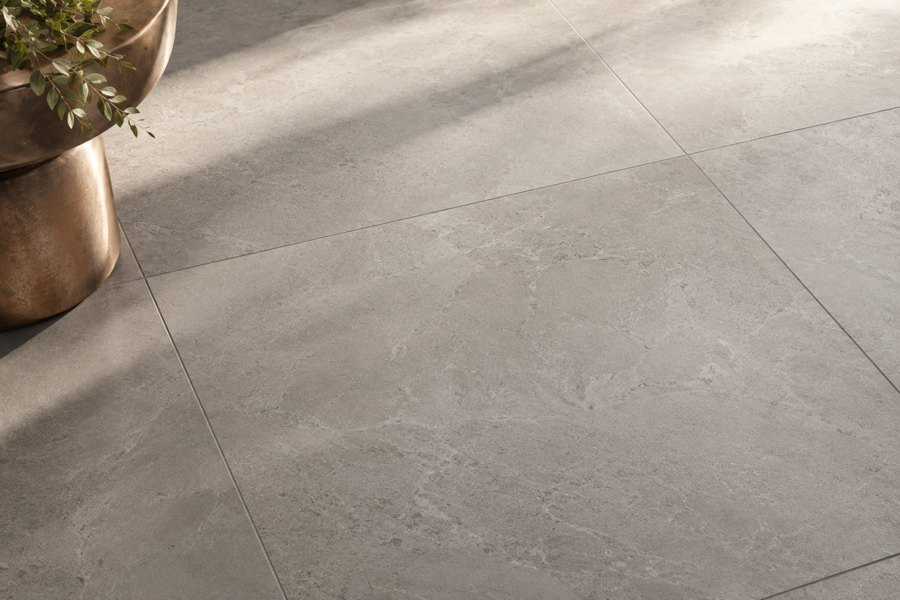 Large-format grey tiles with fine grout lines