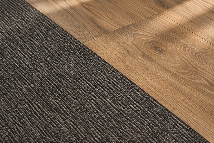 Woven carpet tile and wood-effect luxury vinyl tile